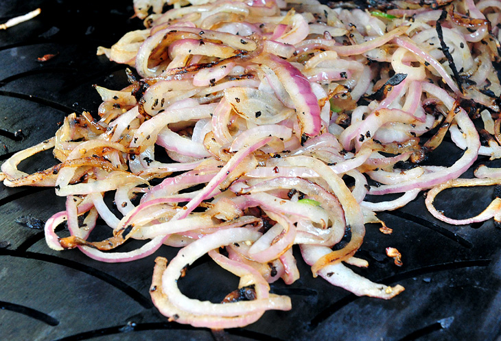 Grilling onions on a Kalamazoo Fish Surface