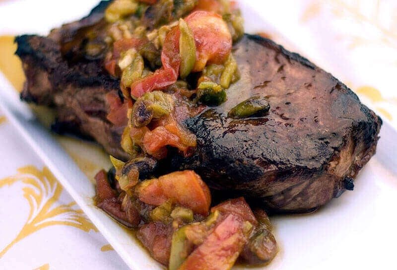 Steak with Roasted Tomatoes, Olives and Pistachios