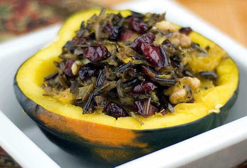 Roasted Acorn Squash Stuffed with Wild Rice and Cranberries