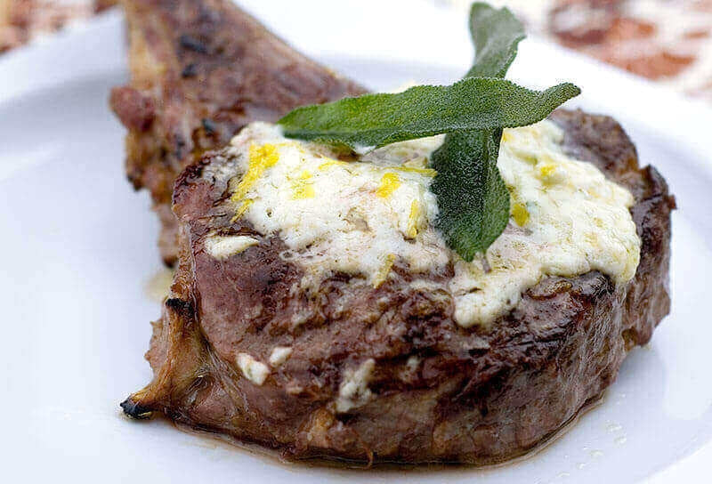 Pasture-Raised Veal Chops with Garlic Herb Cheese Butter and Fried Sage Leaves