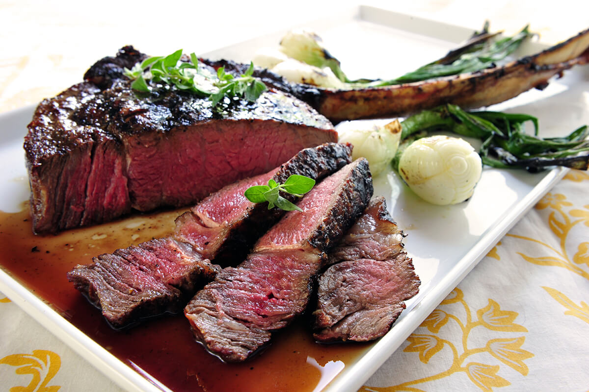 Smoke-Roasted Long-Bone Ribeyes