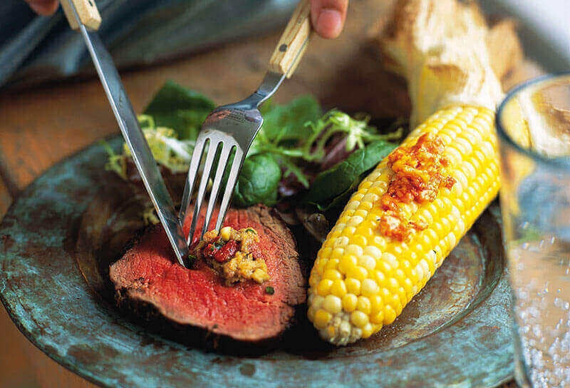 Pesto-Rolled Beef Tenderloin with Roasted Pepper Rouille