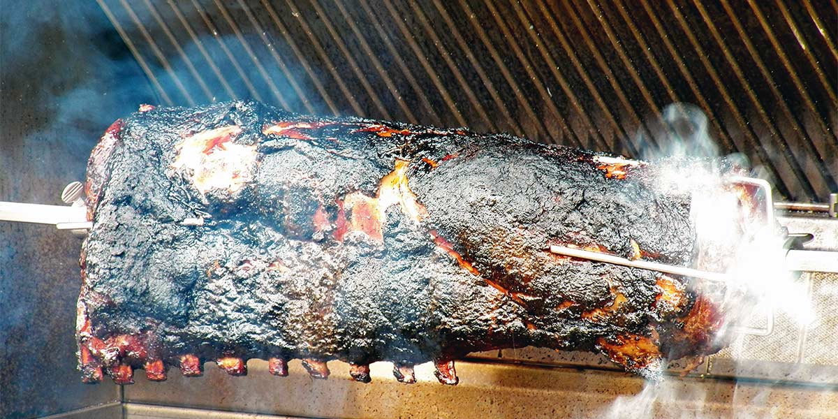 Video: Steven Raichlen Cooks “Smoke-tisserie” Pork on the Kalamazoo Grill