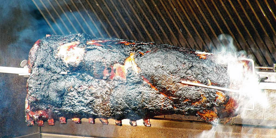 Steven Raichlen Cooks “Smoke-tisserie” Pork on the Kalamazoo Grill