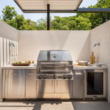 Kalamazoo Hybrid Fire Grill in outdoor kitchen