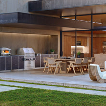 Kalamazoo Hybrid Fire Grill in outdoor kitchen