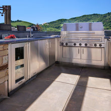 Kalamazoo Hybrid Fire Grill in outdoor kitchen