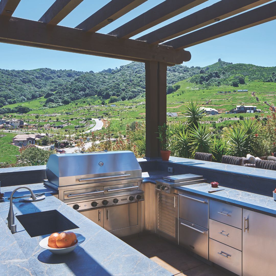 Kalamazoo Hybrid Fire Grill in outdoor kitchen