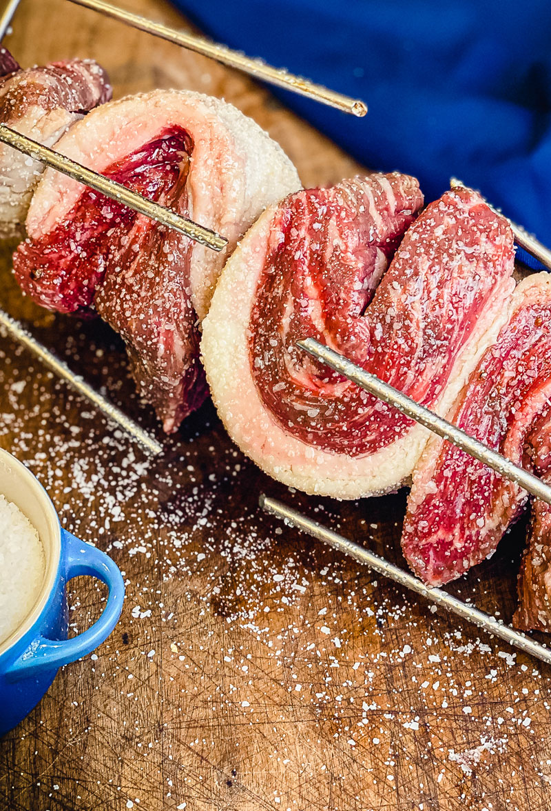 Premium PSD  Steak rotisserie at the steakhouse sliced picanha picanha