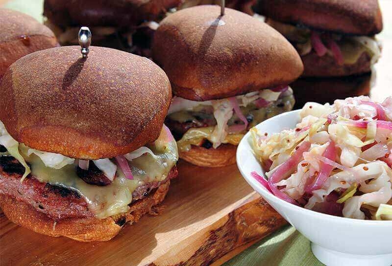 Image of Corned Beef Burgers with Wilted Cabbage Slaw